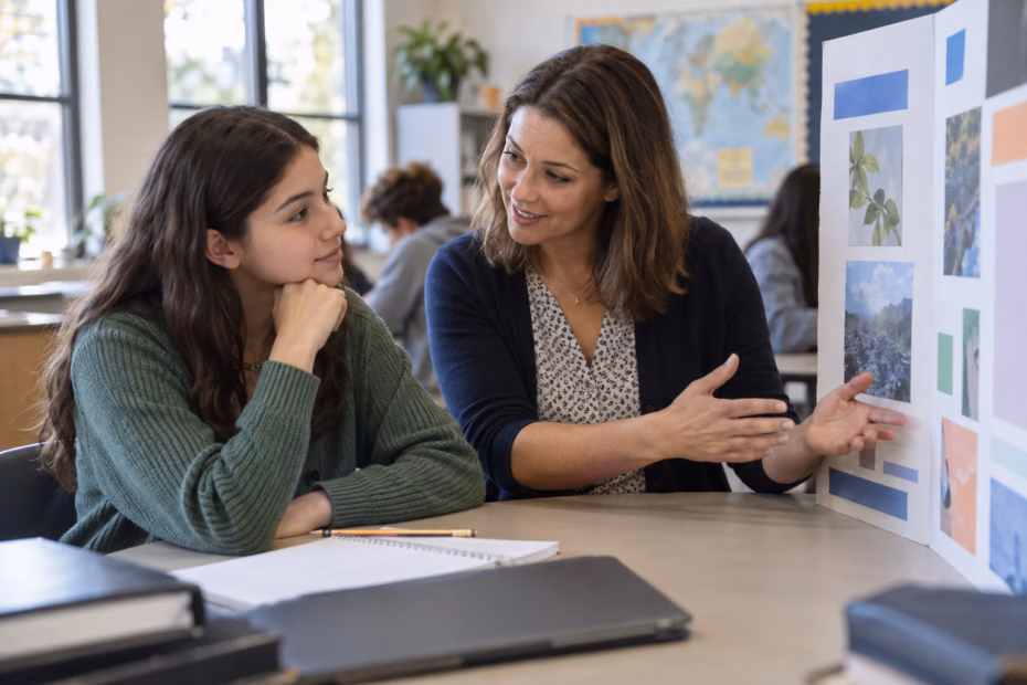 A colleague speaks openly with her project team during a meeting